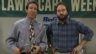 Tim Taylor, de Tim Allen, e Al Boreland, de Richard Karn, olhando para a câmera em Home Improvement